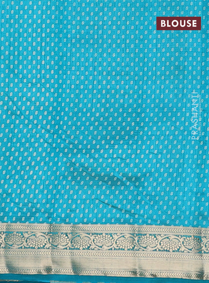 Semi raw silk saree teal blue with allover leaf prints and zari woven border