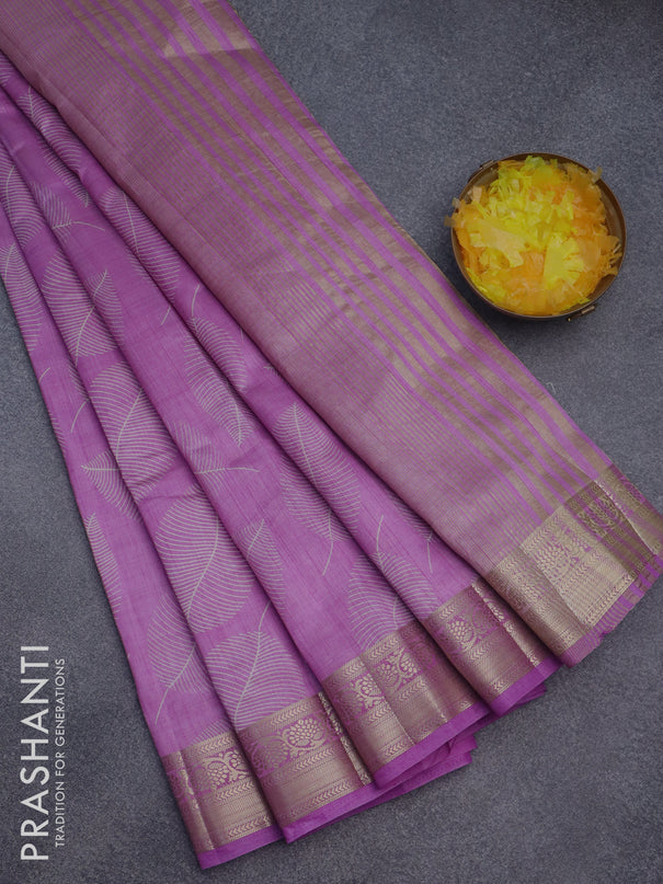 Semi raw silk saree lavender with allover leaf prints and zari woven border