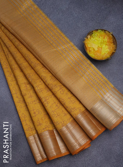 Semi raw silk saree mustard yellow with allover geometric prints and zari woven border