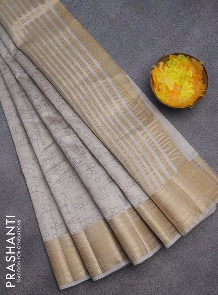 Semi raw silk saree pastel grey with allover geometric prints and zari woven border