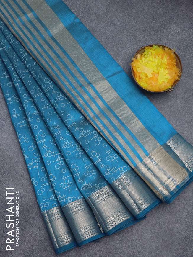 Semi raw silk saree cs blue with allover geometric prints and zari woven border