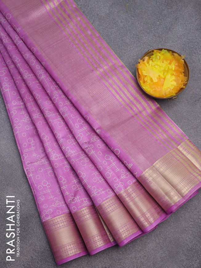 Semi raw silk saree purple with allover geometric prints and zari woven border