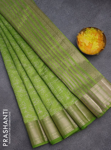 Semi raw silk saree light green with allover geometric prints and zari woven border