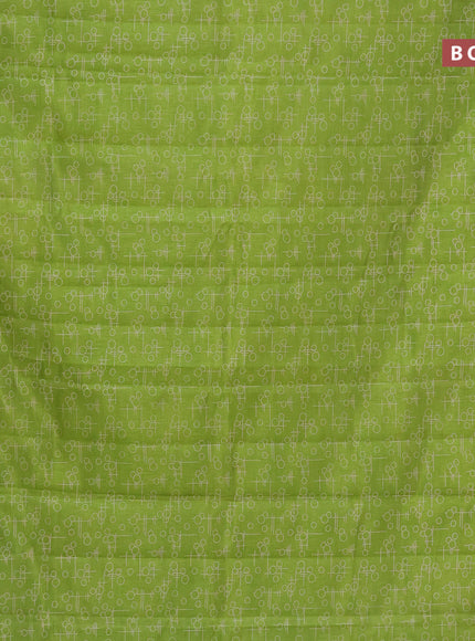 Semi raw silk saree light green with allover geometric prints and zari woven border