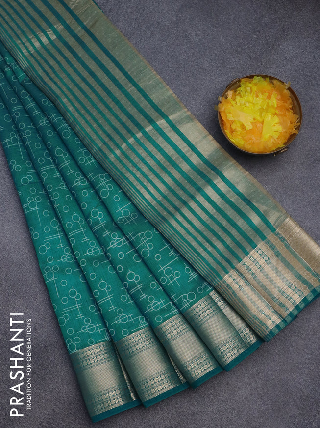 Semi raw silk saree teal blue with allover geometric prints and zari woven border