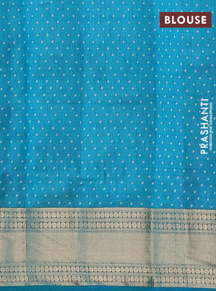 Semi raw silk saree teal blue with allover geometric prints and zari woven border