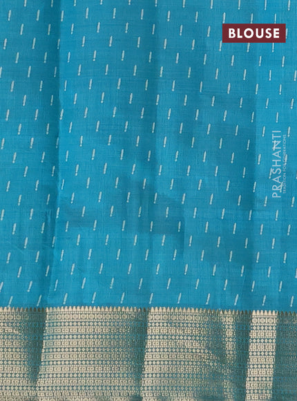 Semi raw silk saree teal blue with allover geometric prints and zari woven border