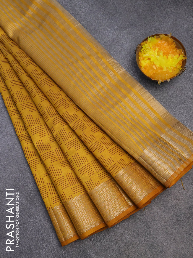 Semi raw silk saree mustard yellow with allover geometric prints and zari woven border