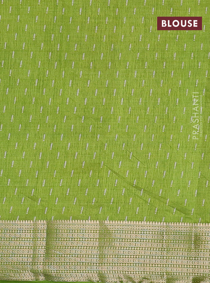 Semi raw silk saree light green with allover geometric prints and zari woven border