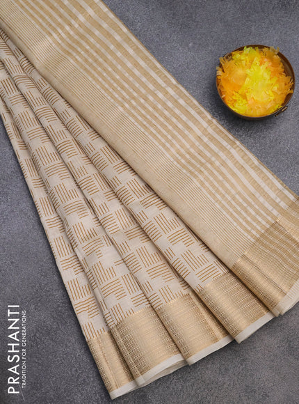 Semi raw silk saree cream with allover geometric prints and zari woven border