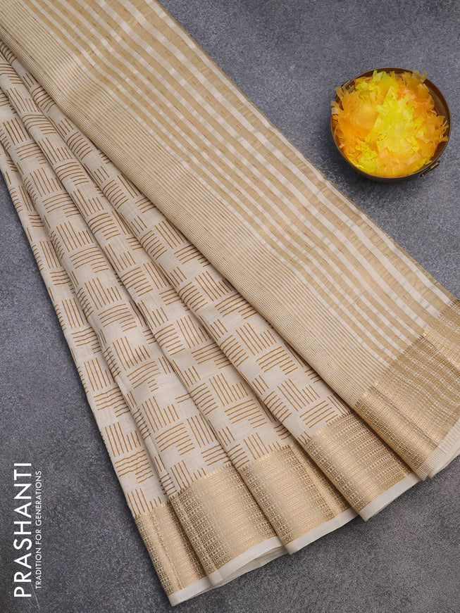 Semi raw silk saree cream with allover geometric prints and zari woven border