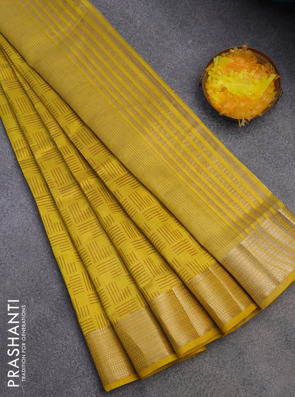 Semi raw silk saree yellow with allover geometric prints and zari woven border