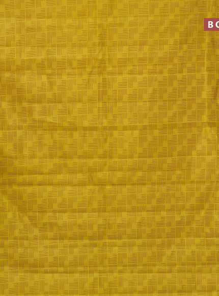 Semi raw silk saree yellow with allover geometric prints and zari woven border