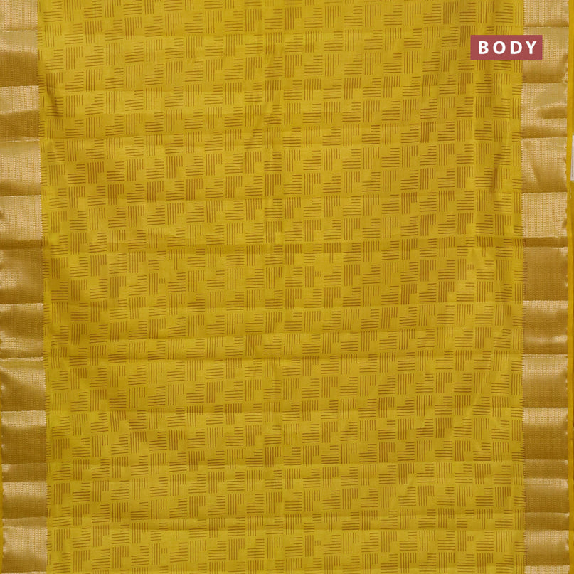 Semi raw silk saree yellow with allover geometric prints and zari woven border