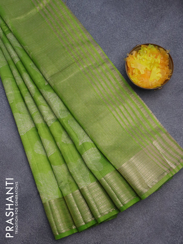 Semi raw silk saree light green with butta prints and zari woven border