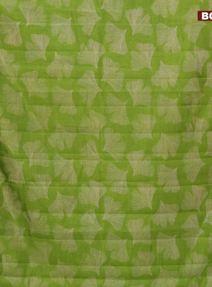 Semi raw silk saree light green with butta prints and zari woven border