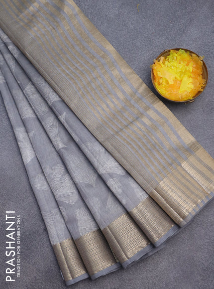 Semi raw silk saree grey with butta prints and zari woven border