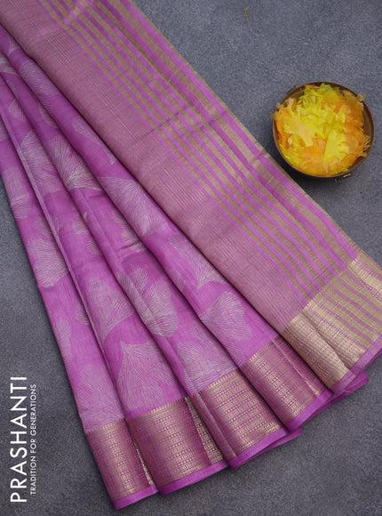 Semi raw silk saree lavender shade with butta prints and zari woven border