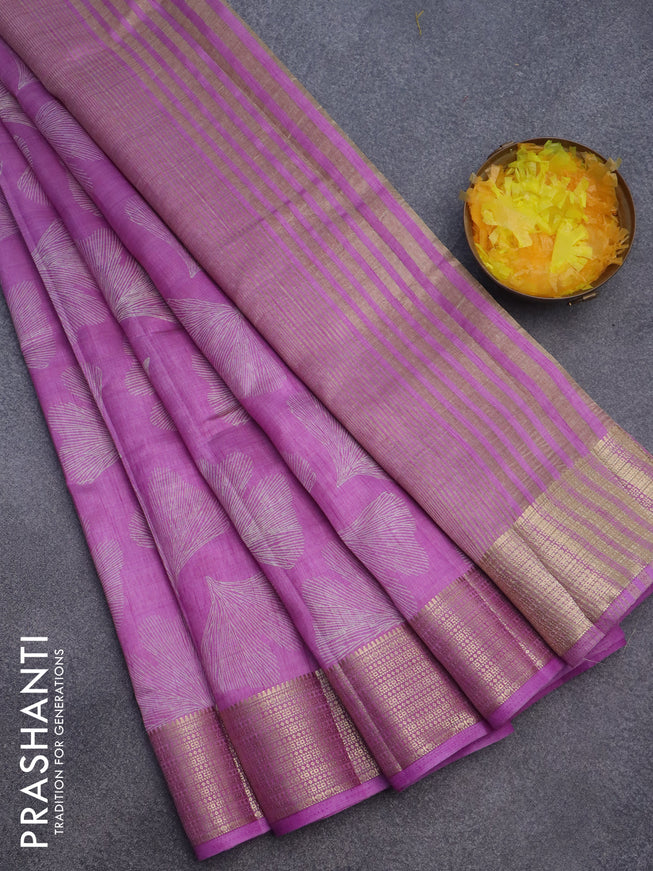 Semi raw silk saree lavender shade with butta prints and zari woven border