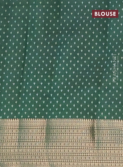 Semi raw silk saree green with butta prints and zari woven border