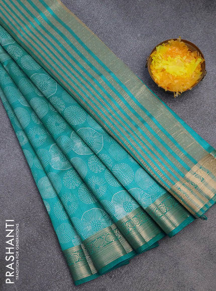 Semi raw silk saree teal blue with allover prints and zari woven border