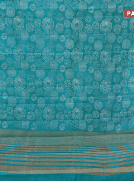 Semi raw silk saree teal blue with allover prints and zari woven border