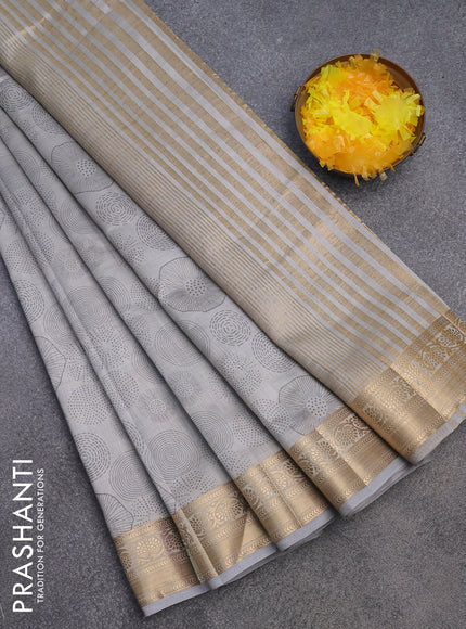 Semi raw silk saree grey with allover prints and zari woven border