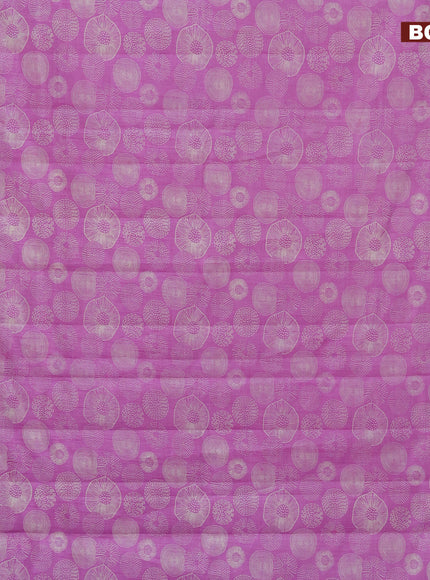 Semi raw silk saree lavender shade with allover prints and zari woven border