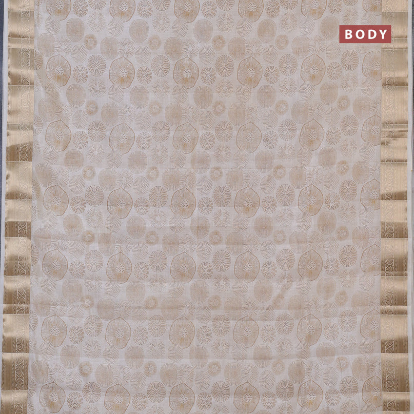 Semi raw silk saree cream with allover prints and zari woven border