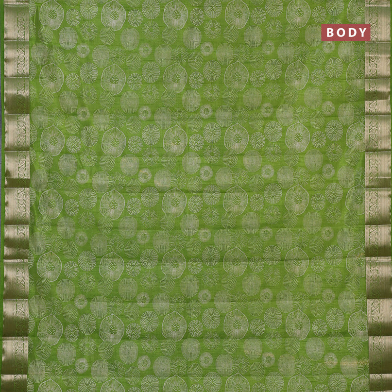 Semi raw silk saree light green with allover prints and zari woven border