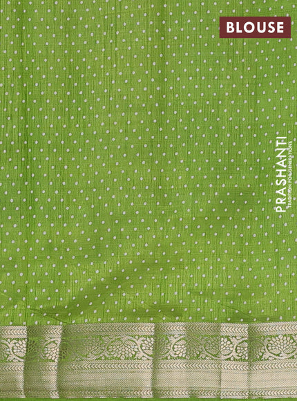 Semi raw silk saree light green with allover prints and zari woven border