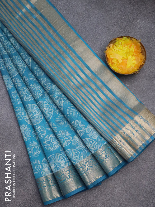 Semi raw silk saree cs blue with allover prints and zari woven border