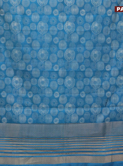 Semi raw silk saree cs blue with allover prints and zari woven border