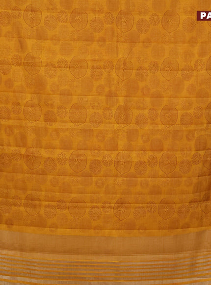 Semi raw silk saree mustard yellow with allover prints and zari woven border