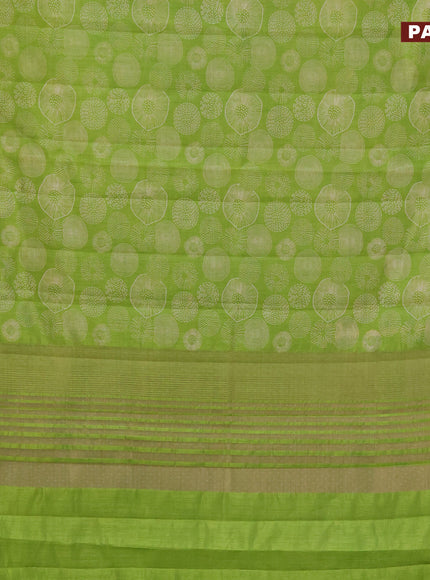 Semi raw silk saree light green with allover prints and zari woven border