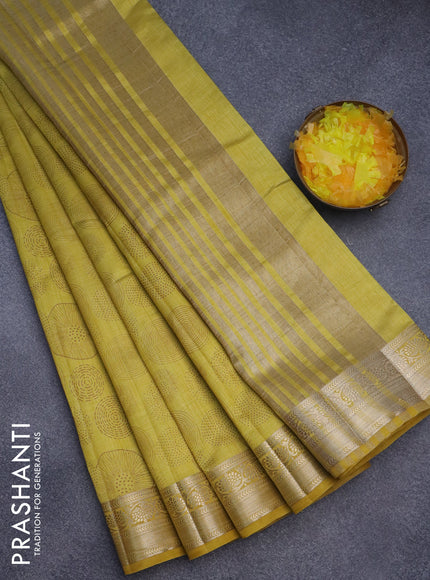 Semi raw silk saree yellow with allover prints and zari woven border