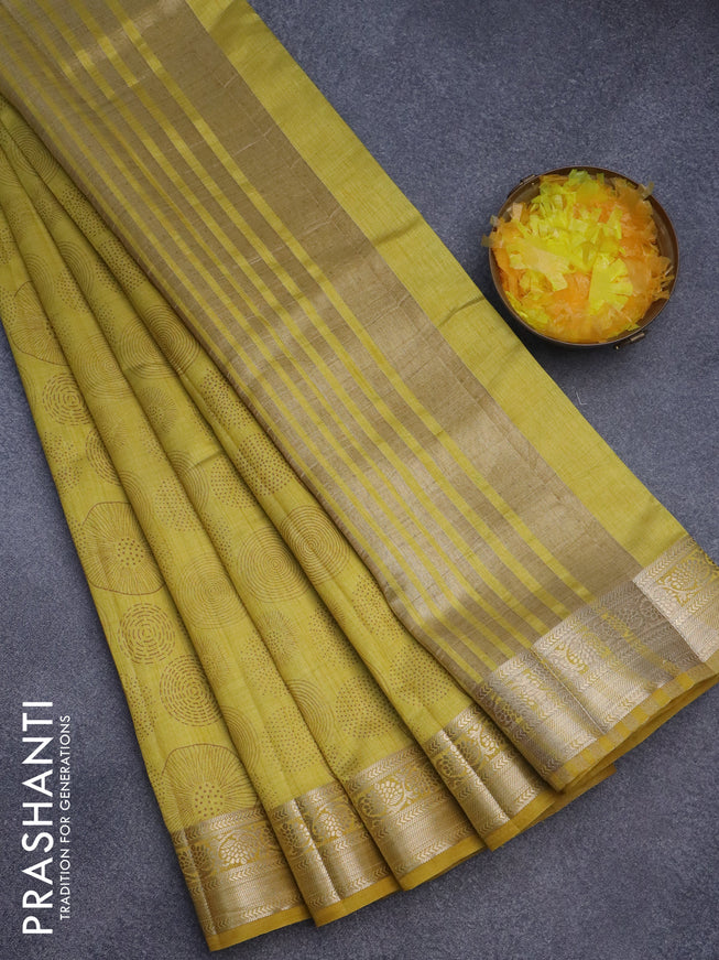 Semi raw silk saree yellow with allover prints and zari woven border