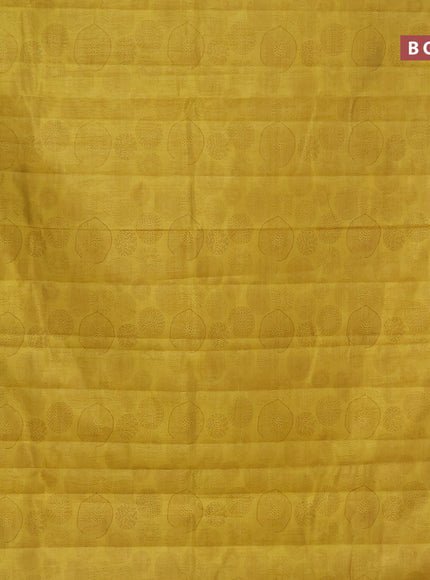 Semi raw silk saree yellow with allover prints and zari woven border