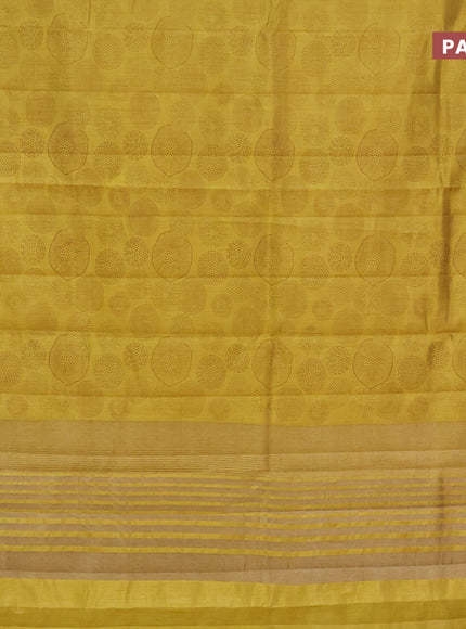 Semi raw silk saree yellow with allover prints and zari woven border