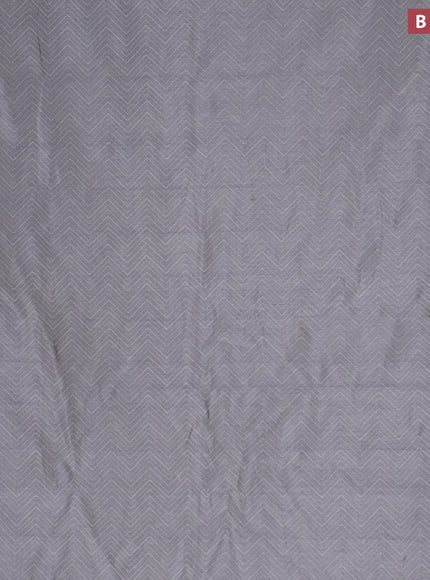 Semi raw silk saree grey with allover zig zag prints and zari woven border