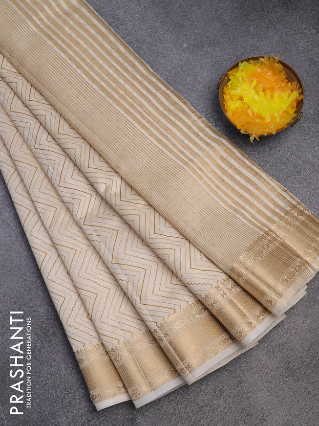 Semi raw silk saree cream with allover zig zag prints and zari woven border