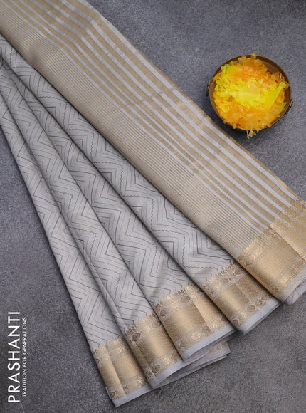 Semi raw silk saree grey with allover zig zag prints and zari woven border