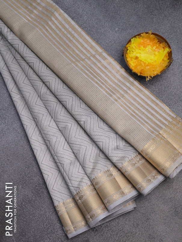 Semi raw silk saree grey with allover zig zag prints and zari woven border