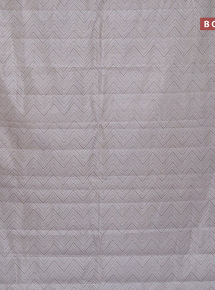 Semi raw silk saree grey with allover zig zag prints and zari woven border