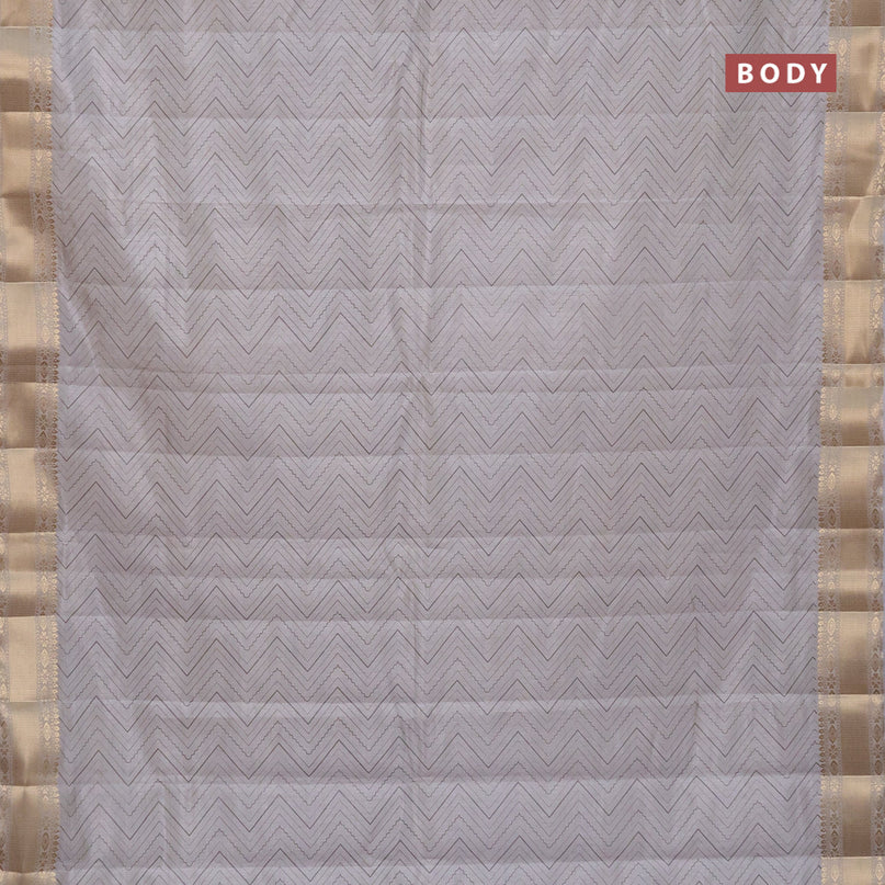 Semi raw silk saree grey with allover zig zag prints and zari woven border