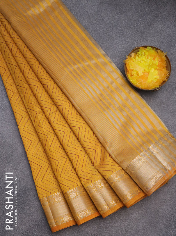 Semi raw silk saree mustard yellow with allover zig zag prints and zari woven border