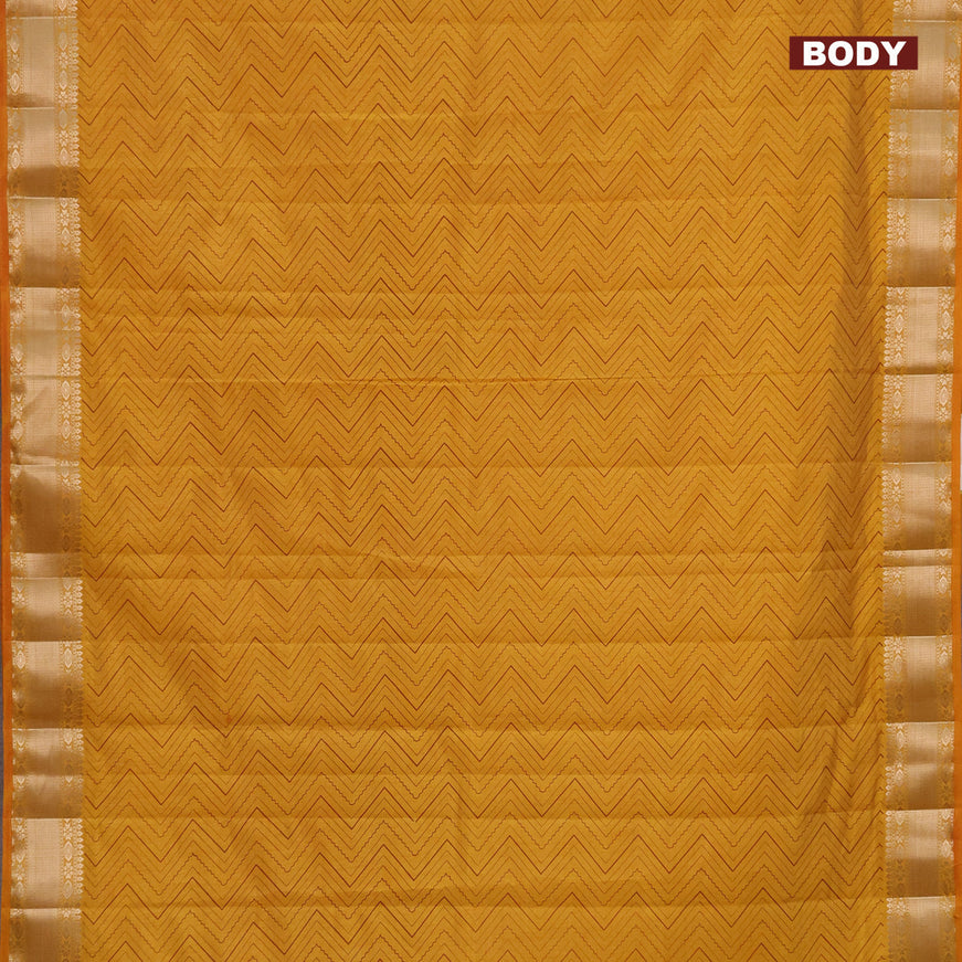 Semi raw silk saree mustard yellow with allover zig zag prints and zari woven border