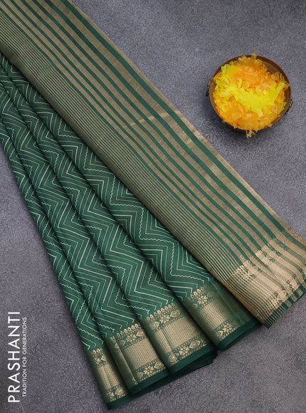 Semi raw silk saree green with allover zig zag prints and zari woven border