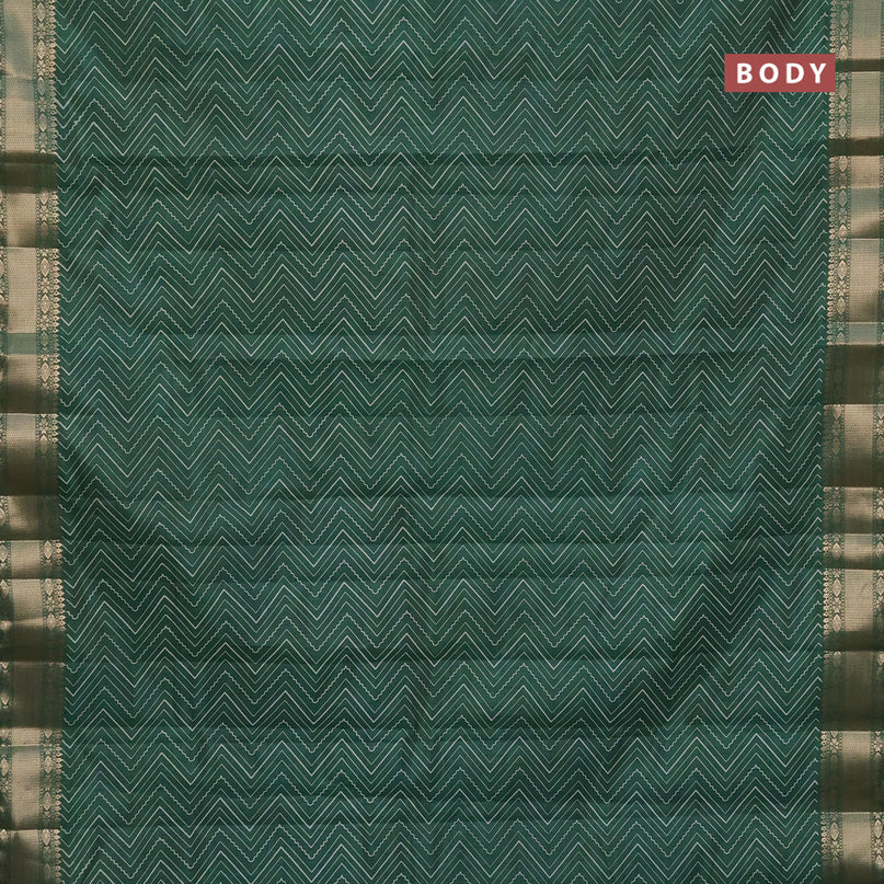 Semi raw silk saree green with allover zig zag prints and zari woven border