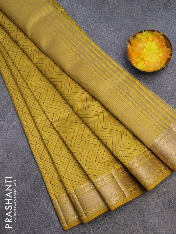 Semi raw silk saree yellow with allover zig zag prints and zari woven border